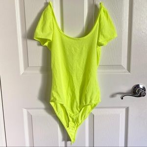 neon yellow bodysuit